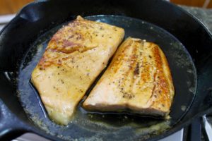 Maple glazed salmon with herb and feta toss salad